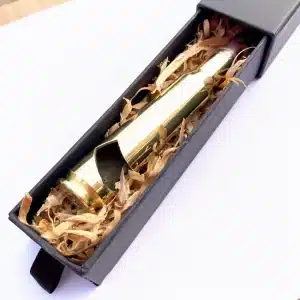 50 Calibre Bullet Bottle Opener in Gift Box on a Bed of Wood Shavings