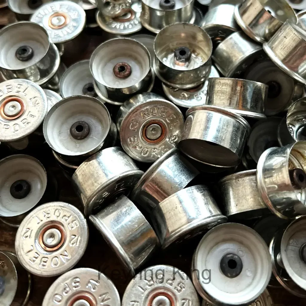 Accessories Create stunning bullet crafts with real 12 gauge shotgun base caps. Authentic, recycled casings ideal for resin art, jewellery, magnets, and handmade gifts.