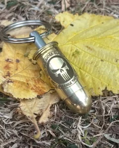 Laser Engraving Services Bullet keyring engraved in a dark style with an image of a film. Perfect for gifts and promotional items