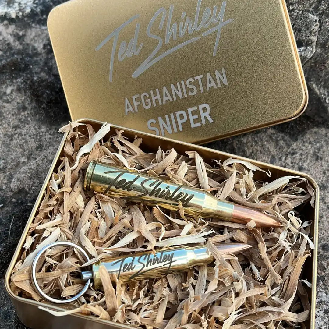 Ted Shirley .338 Lapua Magnum Bullet | Real Sniper Round Official Ted Shirley 'Afghanistan Sniper' merchandise. Handcrafted inert .338 Lapua Magnum and 7.62 NATO bullet keyring laser-engraved with his signature in a gold gift tin