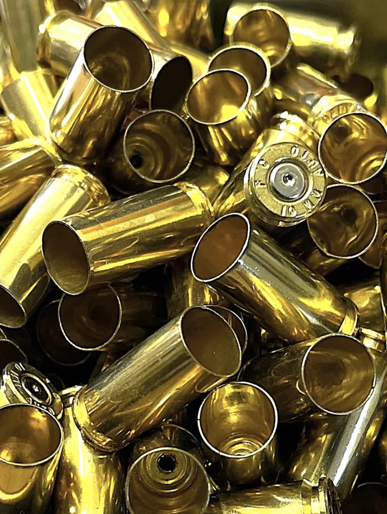 Pack of 10 spent 10mm brass bullet casings for craft and resin art projects.